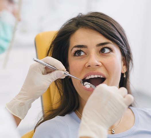 Patient receiving tooth extraction